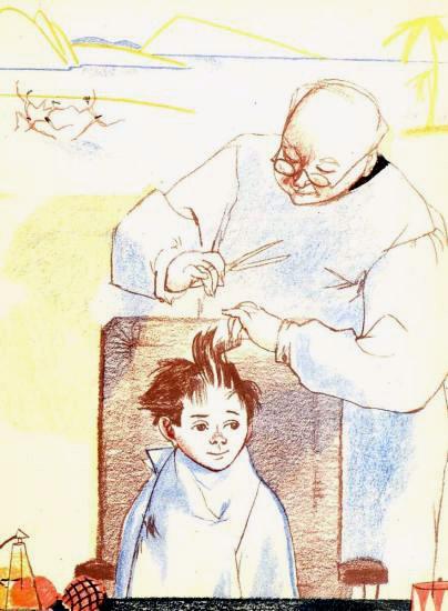 парикмахер стрижет мальчика